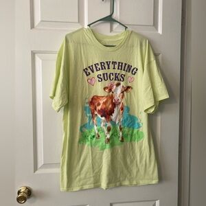 “Everything sucks” cow graphic tee